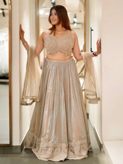 Another beautiful shot of the light green lehenga, showing its full A-line skirt and sparkling blouse. It’s an effortlessly elegant look.