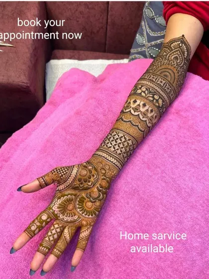 A full-arm design with beautiful, flowing patterns. I offer home service and a free trial to ensure you are completely happy with your design.