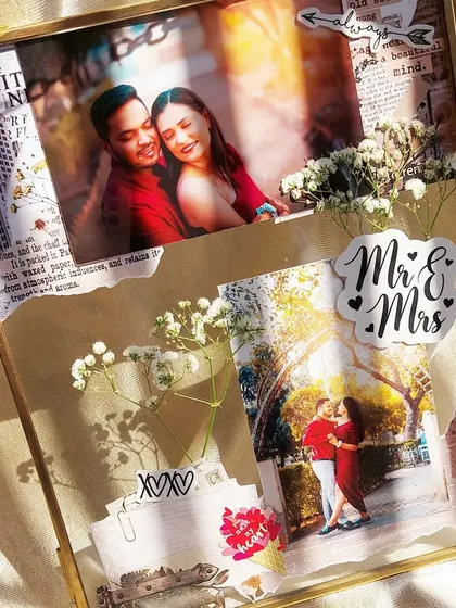 Our copper hanging vintage frames are a stylish way to safeguard your memories. This one, featuring a 'Mr & Mrs' sticker, is a perfect gift for a newlywed couple to display their favorite photos.