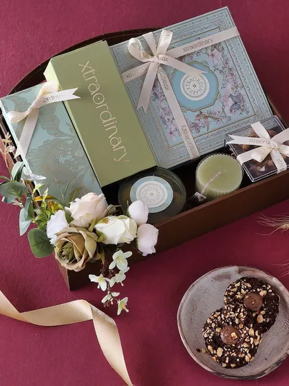 The Diwali Delight hamper is a curated selection of our bestsellers, including fudge brownies, nutty barks, trail mix, sugar-free mithai, and hazelnut cookies.