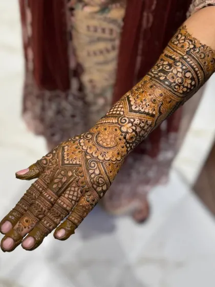 This is a detailed view of my intricate bridal henna work. Each design is unique, combining traditional patterns like paisleys and mandalas with fine-line fillers to create a stunning, full-coverage look for your special day.