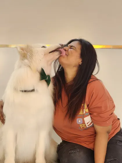 Unconditional love and sloppy kisses. This is the reward for patient and gentle grooming. This beautiful husky knows he is safe and loved here.