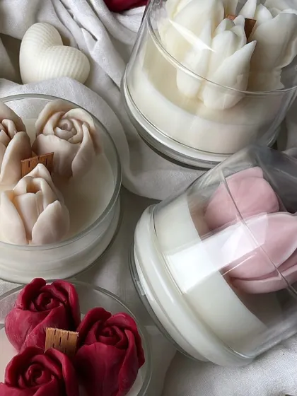 Tulip heaven! These tulip-in-a-jar candles are the perfect blend of floral beauty and cozy candlelight. Available in various colors.