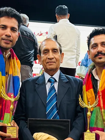 Posing with my award alongside Dr. A. K. Bansal, President of PEFI. It is an honor to be recognized among such esteemed figures in Indian sports.