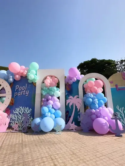 The complete setup creates a perfect, picturesque backdrop for a memorable poolside event.