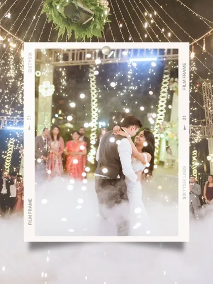A magical first dance surrounded by sparklers and smoke. The film-strip frame adds a nostalgic and cinematic touch to this romantic moment.