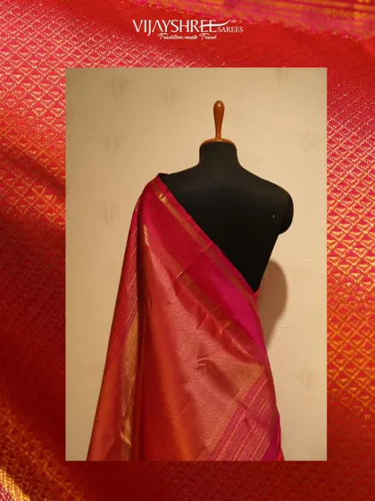 The simple elegance of the pink Kanjivaram, with its clean lines and rich color.