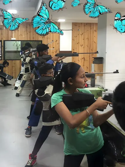 A fun moment during a youth training session. I strive to create a positive and engaging atmosphere where kids can learn and grow, training alongside national and international level shooters.
