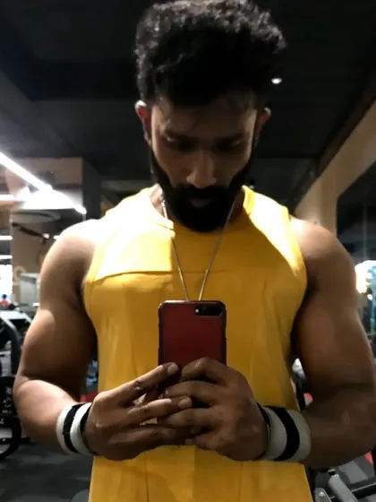 Fall in love with the process and the results will come. A selfie capturing the delt pump after a tough shoulder workout.