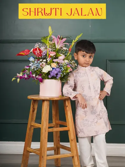 Another little model looking sharp in my printed kurta set. The soft pink hue and subtle pattern make it a great choice for daytime events and celebrations.