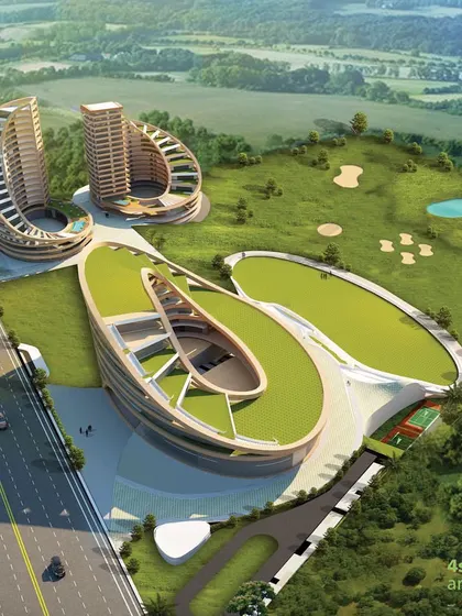 A render of the Urban Centre for Excellence in Telangana, showcasing its unique, curved towers and expansive green roofs designed to blend with the landscape.