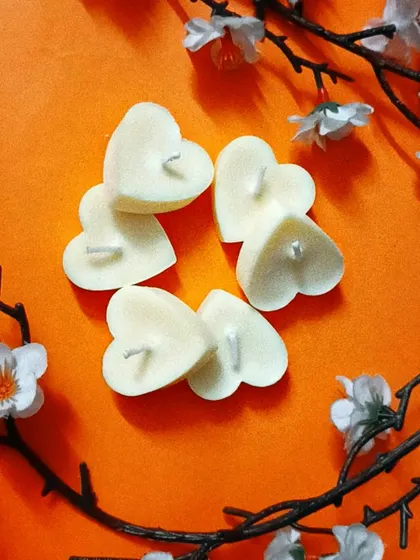 My artisanal soy wax tealights are handcrafted with love. This pack of six heart-shaped candles is perfect for creating an elegant and luxurious ambiance.