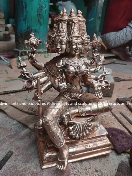 A newly made South Indian icon of Goddess Gayatri, seen here in our workshop. The piece is still undergoing the finishing process of chiseling and polishing to bring out its full brilliance.