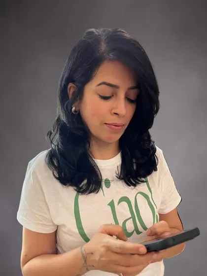Working with Jyoti’s natural texture to create movement and style with layers and side-swept bangs.
