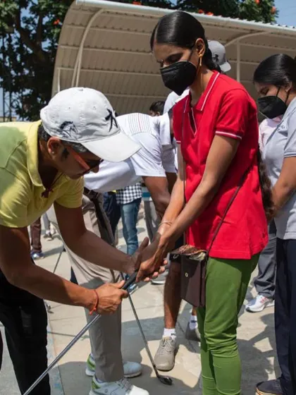 A close-up of grip instruction with a visually impaired student. It's all about ensuring the hands are working together as one unit.