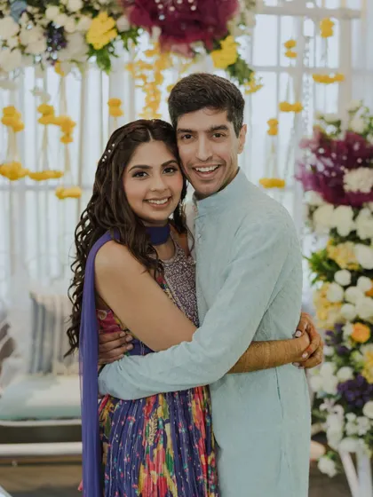A sweet moment with her partner during the Mehendi.
