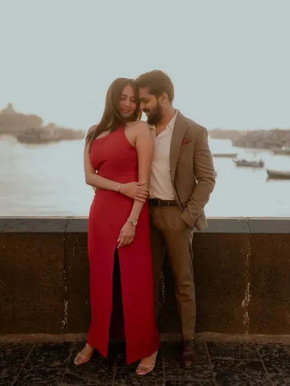 A beautiful portrait of the couple, with the warm sunrise light creating a romantic glow.
