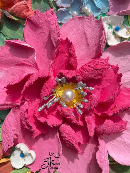 A macro shot of the central pink peony from the "Valley of Flowers" piece. The detail is incredible, right down to the pearl and silver stamen at the flower's heart.