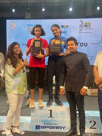 Our players Preksha and Divisha on the podium at the JITO National Games. Their performance included multiple gold medals in doubles and singles.