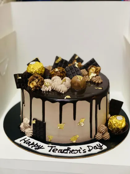 Nothing says 'thank you' like a rich, decadent chocolate cake. This Ferrero Rocher cake, loaded with Nutella and hazelnut, is the perfect way to show appreciation. It's a popular choice for special occasions like Teacher's Day or as a corporate gift.