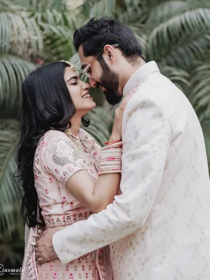 An intimate and romantic close-up, capturing the loving gaze between the couple during their pre-wedding shoot.