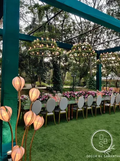The reception dinner setting was designed for a delightful and serene experience. Lush floral tablescapes and twinkling lights created a magical ambiance for guests.