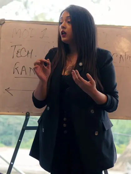 An instructor explaining vocal techniques during a workshop. We bring in experts to share their practical knowledge.