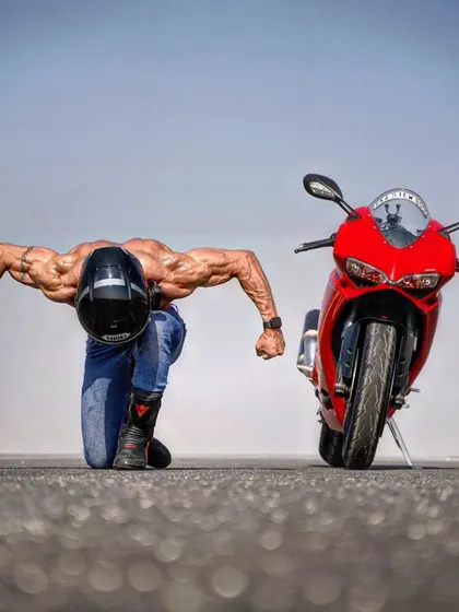 On your marks... Get set... FLEX. A playful and powerful pose with my Ducati, combining the worlds of bodybuilding and motorsports.