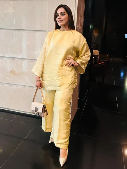 Styled by me. I'm upgrading my wardrobe with this stunning yellow Choga set. Its loose, flowing fit offers effortless charm, perfect for any festive or traditional vibe.