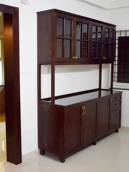 A duplicate of image 89, showing the classic and functional design of the dark wood crockery unit.