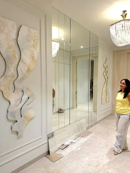 A wide shot of the installed piece, showing how it interacts with the architecture and decor of the home.