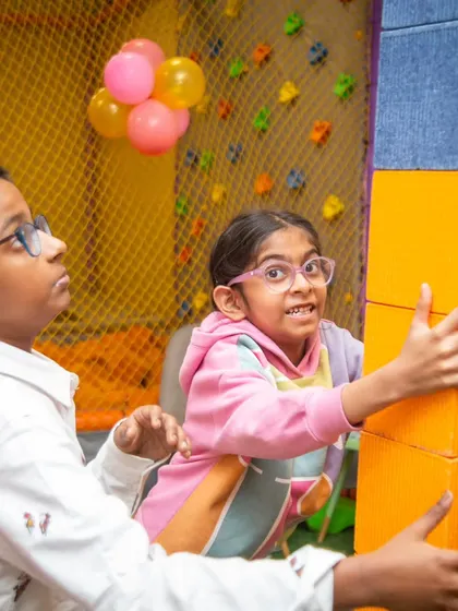 Working together to build a giant tower with our colorful foam blocks. This area encourages creativity and teamwork.