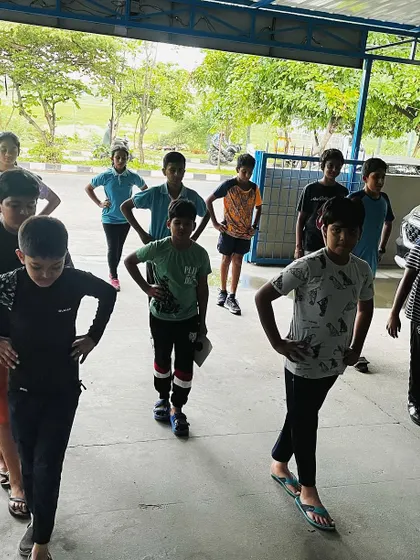 Our shooters performing body balance exercises. A stable stance is critical for precision shooting, and these drills are designed to strengthen core muscles and improve stability.