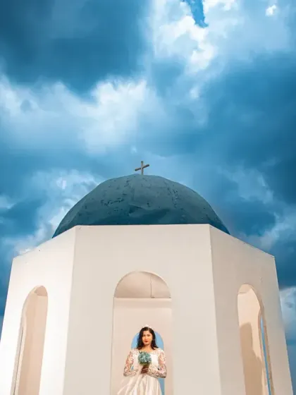 The same scene as the previous shot, but in color, showing how a dramatic blue sky can completely change the mood of a portrait.