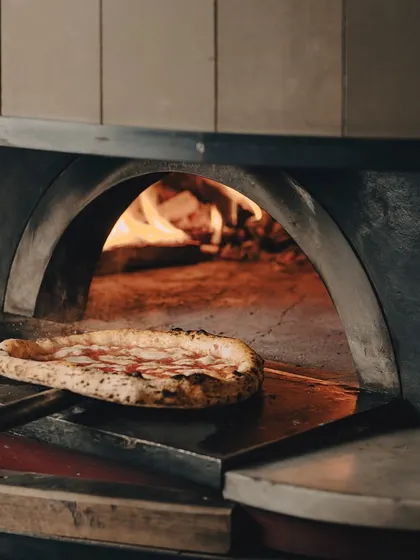 Hot, fresh, and straight out of the oven. This pizza is not just ready, it is begging to be devoured.