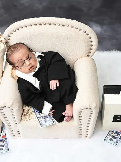 Another shot of our little boss, sleeping on the job. This theme is perfect for parents who want a portrait with a touch of humor.