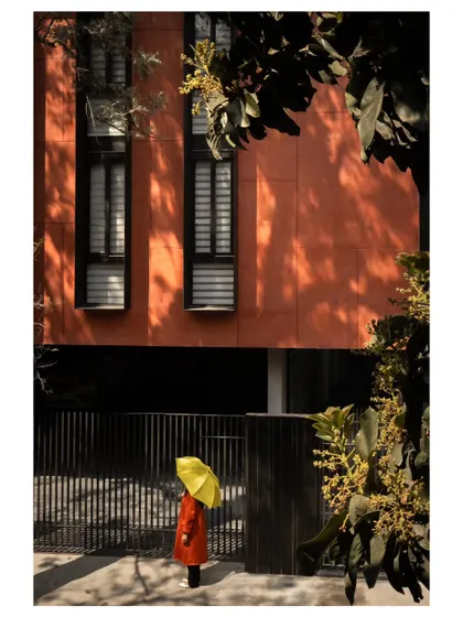 This view highlights the relationship between the building and its streetscape. The design provides a distinct and modern identity while remaining sensitive to its residential surroundings.