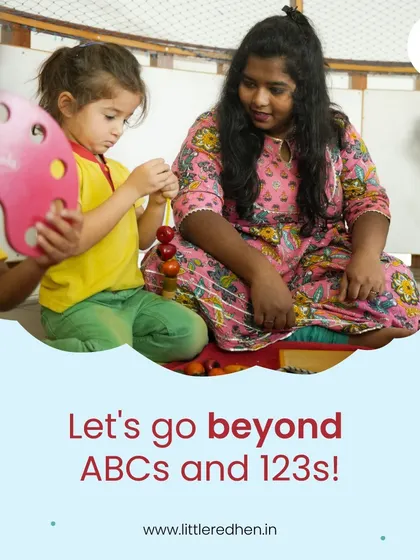 A teacher and child work together with colorful beads and a threading toy. Our curriculum goes beyond ABCs and 123s, using diverse activities to nurture all aspects of a child's development.