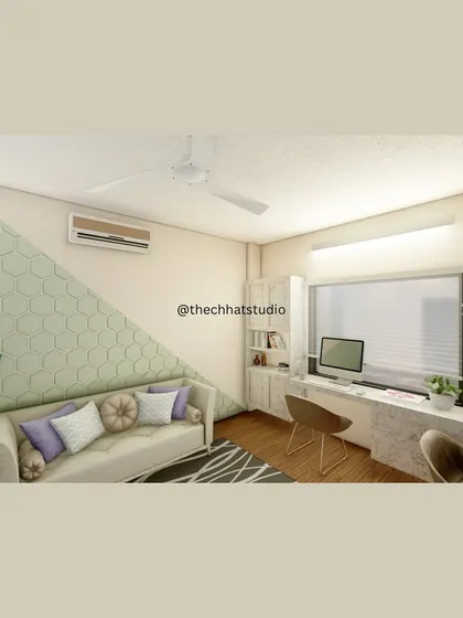 This study room design uses a geometric honeycomb feature wall in a soft green to add a touch of modern style. The space includes a comfortable sofa for reading breaks and a well-lit desk area, balancing work and relaxation.
