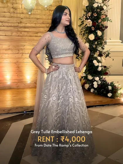 A chic and modern grey tulle embellished lehenga. It's an understated yet elegant option for any wedding function.