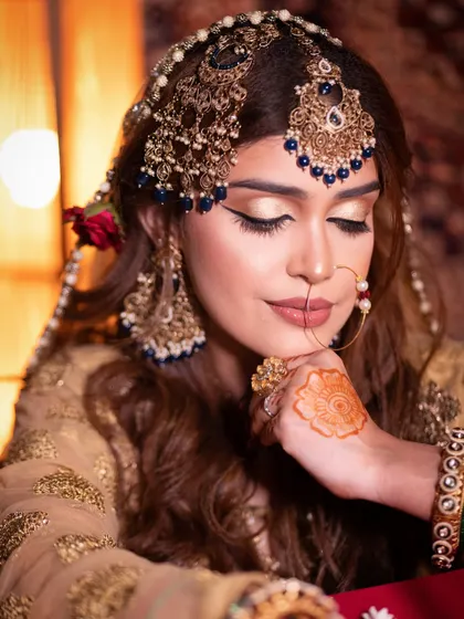 Timeless beauty meets modern glam. This Heeramandi-inspired look features a sharp winged liner and glowing skin, a perfect fusion of classic and contemporary artistry.