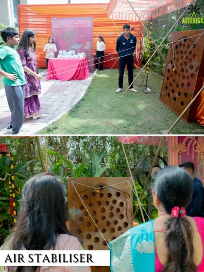 The "Air Stabiliser" game requires teamwork and focus. We love incorporating unique games that encourage guests to interact and work together.
