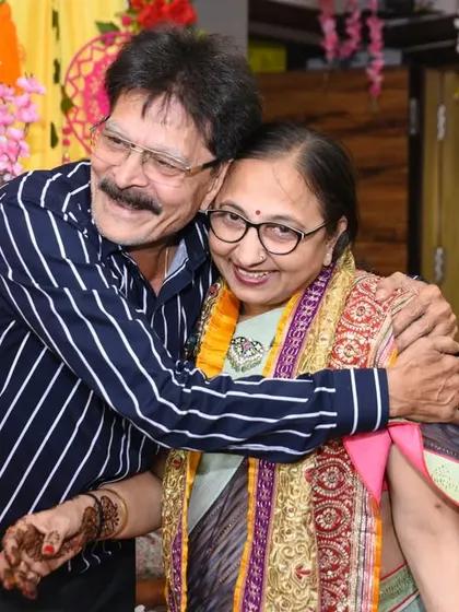 A warm hug between family members, a candid shot full of emotion and connection.