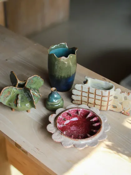 A collection of imaginative, sculptural pieces created by our students, from a pomegranate inspired bowl to abstract, organic forms.