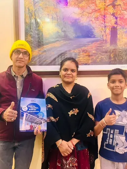A family gives a thumbs-up after deciding to install our solar system. We are committed to customer satisfaction and a seamless experience.