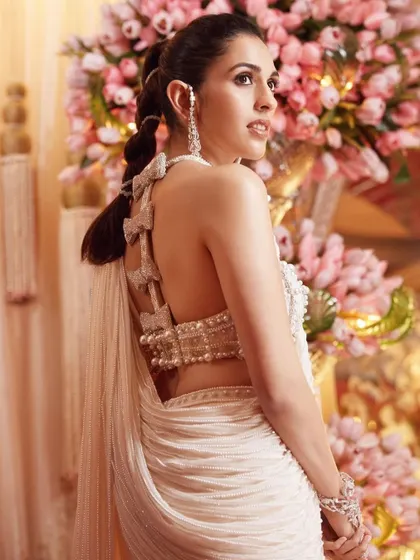 The back of the Tamara Ralph saree is a masterpiece. The bow details and the unique braided hairstyle came together to create a look that was stunning from every angle.