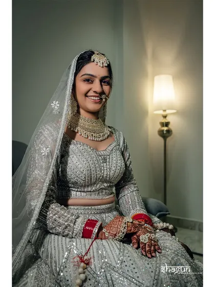 A beautiful, smiling portrait of the bride, ready for her wedding. Her joy is absolutely radiant.