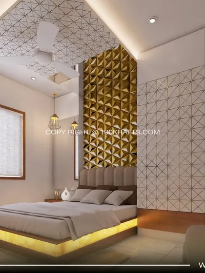 This bedroom combines a floating bed with under-lighting and a stunning 3D geometric gold accent wall for a touch of opulence.