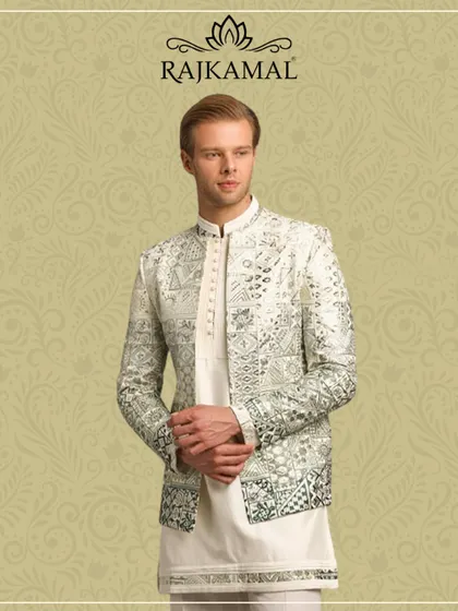 A model wearing a striking grey Indo-Western jacket with all-over sequin work, paired with a classic white kurta. This is a perfect statement outfit for a Sangeet or wedding guest.