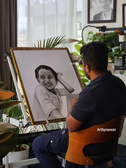Me admiring the final details on this large-scale child's portrait. The A1 size allows for an incredible amount of detail and impact.